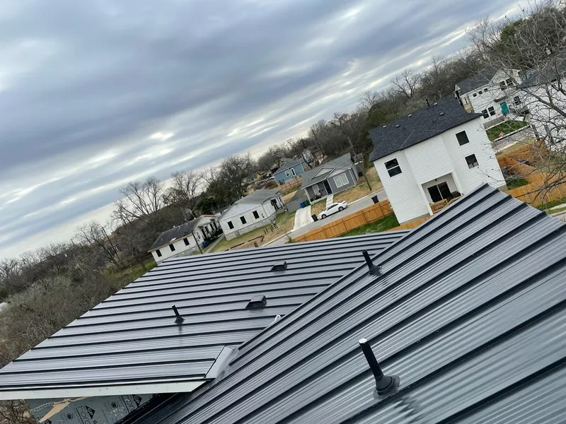 Standing seam metal roof panels with vents for Skylight Repair in Decorah